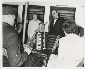 Musicians playing and singing on boat ride