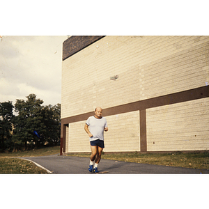 Man jogging on an outdoor track