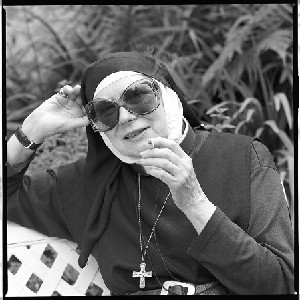 Mother Frances Meigh, "independent" nun (not attached to any order) who ordained Bishop Pat Buckley. She lives in Forkhill, Co. Armagh. Portraits taken at home including some of her smoking and wearing what she calls her "Hollywood" sunglasses