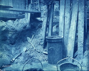View of shovels and buckets in gasholder excavation at Commercial Point Station