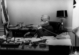 Side shot of Thomas P. O'Neill talking on phone in congressional office
