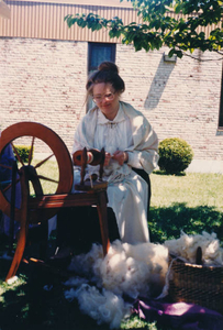 Susan spinning at a sheep-to-shawl demonstration