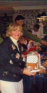 As the Gingerbread Lady I prepare a house to be wrapped for a family