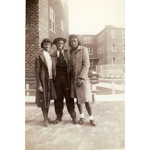 "Winnie" Irish poses with two friends in the Lenox Street Projects