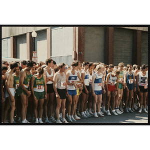 Runners wait at the start line of the Battle of Bunker Hill Road Race