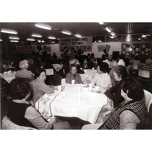 Guests at the Josiah Quincy School celebrate Chinatown's victory to build a community center on Parcel C