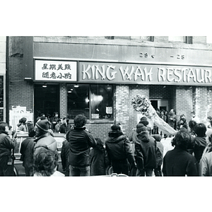 Dragon puppet is displayed in front of King Wah Restaurant in Boston's Chinatown during the Chinese New Year celebration