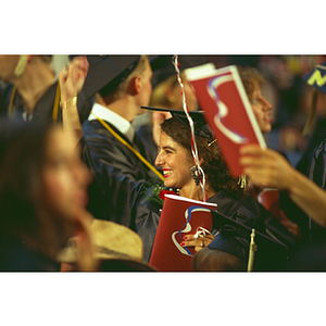 Students cheering at commencement