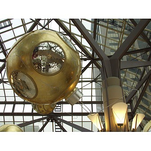 An oversize Christmas bulb ornament hanging inside of the Prudential Center