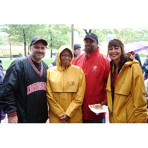 Senior Vice President of Enrollment Management and Student Affairs Philomena Mantella (far right) stands with NU supporters before the football game