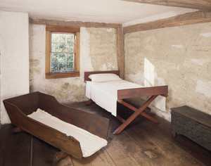 Chamber showing bed and cradle, Coffin House, Newbury, Mass.
