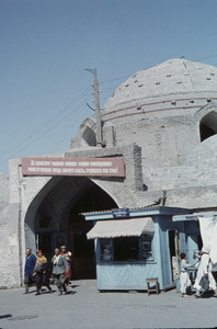 Vaulted gateway with propaganda posters