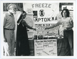 Andrea Ayvazian (far right) with Nuclear Freeze display at the Three County Fair