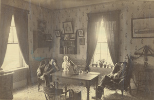 C. O. Lovell and H. B. Emerson sitting indoors