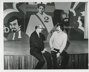 Dr. DiMichael shaking hands with man at Christmas party