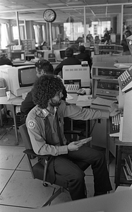 Unidentified Emergency Medical Technician in Boston Police Dispatch Operations Center