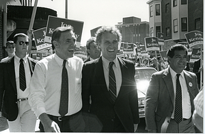 Mayor Raymond L. Flynn walking in procession with Joseph Kennedy