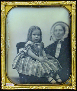 Unidentified woman and child