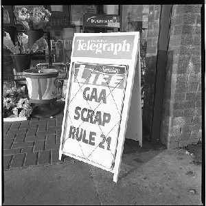 "GAA scrap Rule 21," headlines on newspaper hoarding when Rule 21 which prevented Gaelic football players from taking part in "foreign games" (such as soccer) was abolished