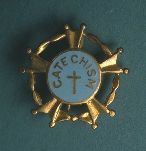 Catechism pin