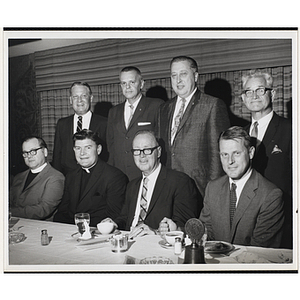 Group portrait of eight officers at a Kiwanis Club event in Roxbury, Boston