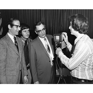 A TV camera being set up for Law School's moot court