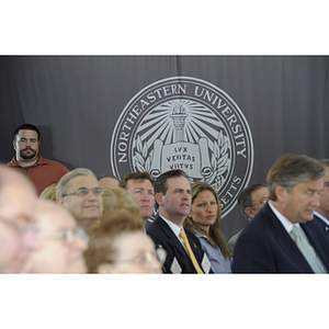 The audience sits and listens during the groundbreaking ceremony for the George J. Kostas Research Institute for Homeland Security