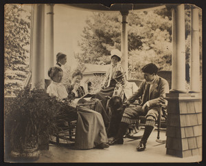 Portrait of an unidentified family with dog, location unknown, undated