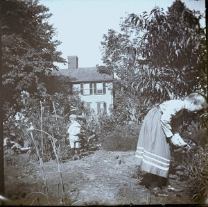 Alice Train Brown and John Freeman Brown, Jr. playing in the garden of the John Crehore House, Milton, Mass.