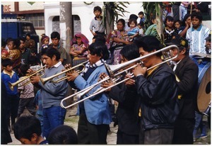 Musicians playing at a funeral procession and Fiesta de Ano Nuevo celebration