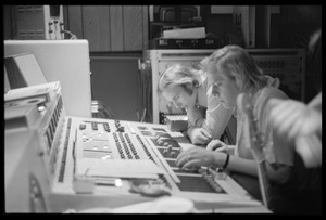 Stephen Stills (left) and Bill Halverson (sound engineer) working at the mixing board in Wally Heider Studio 3 while producing the first Crosby, Stills, and Nash album
