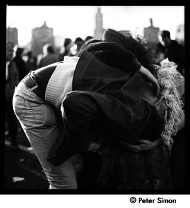 Couple in a gymnastic embrace at the Be-In, Central Park, New York City