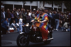 Motorcyclists, one wearing pride colors, in the San Francisco Pride Parade