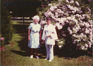 Grace Hubbard in her yard with Mrs. Laurence Carruth