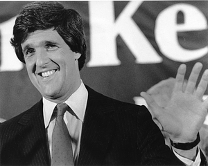 Senator John Kerry waving to an audience