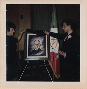 Two Portuguese American youth unveiling painting