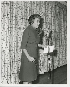 Mrs. William S. Kilbourne speaking at Christmas party