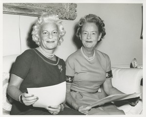 Margaret Milbank Bogert and an unidentified woman reviewing paperwork