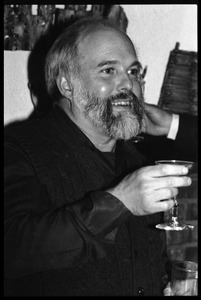 Robert H. Abel: informal portrait lifting a glass, at the book party for Robert H. Abel