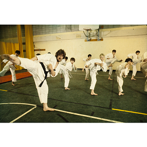 Group of students practicing martial arts