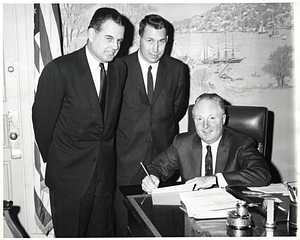 Two unidentified men and Mayor John F. Collins