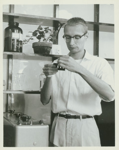 Arthur Christopher Gentile standing indoors, working in laboratory