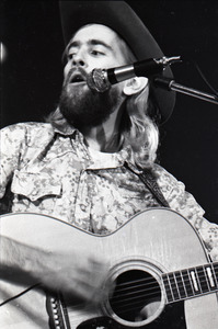 New Riders of the Purple Sage opening for the Grateful Dead at Sargent Gym, Boston University: John 'Marmaduke' Dawson playing acoustic guitar and singing