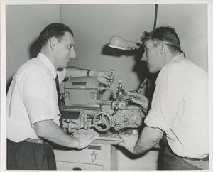 Two men in machine shop