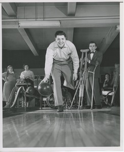 Client bowling at Sadie Hawkins Day dance