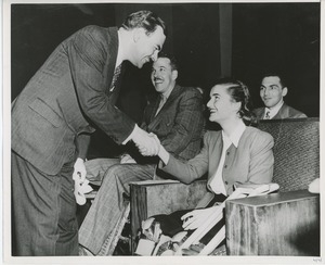 Governor Thomas E. Dewey shaking hands with clients at Institute Day