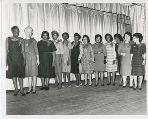 Women with corsages at Thanksgiving celebration