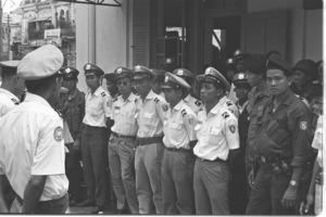Vietnamese policemen line up for duty in Cholon, Saigon.