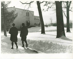Two students walking to class at Schoo-Bemis in Winter
