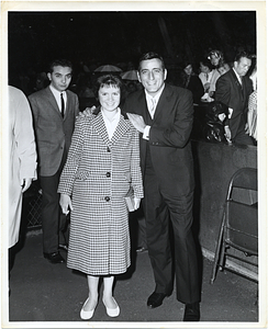 Singer Tony Bennett with an unidentified woman